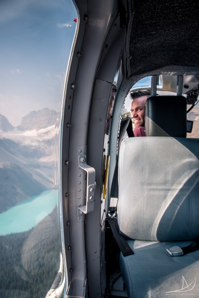 Helicopter flight over a glacier lake