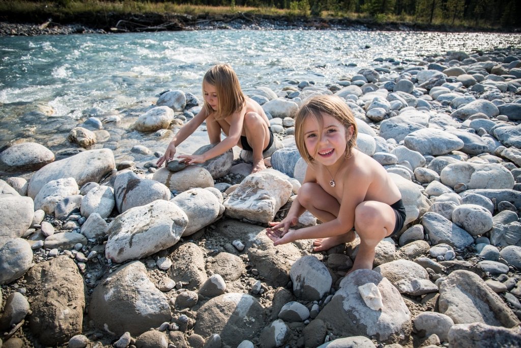 Enjoying what a Canadian summer has to offer, playing in the glacier rivers and getting mucky.